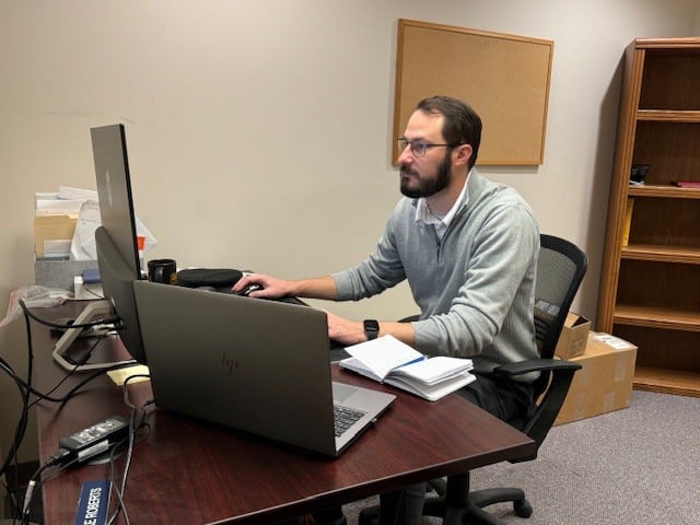 Alex W at desk 3